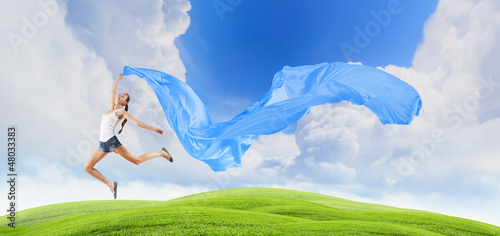 Photo: Modern style dancer against blue sky Modern style dancer against blue sky