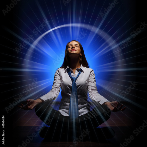 Photo: Business woman meditating Business woman meditating