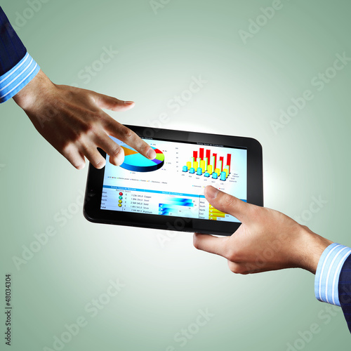 Photo: Modern computer technology in business Modern computer technology in business