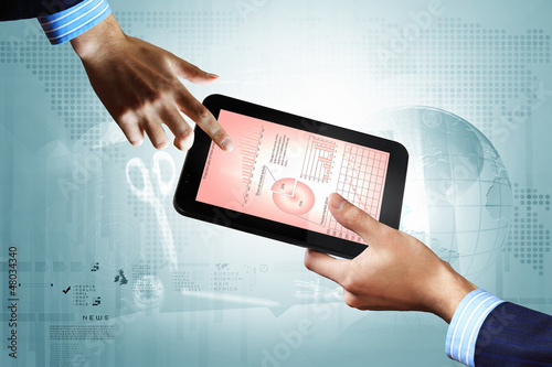 Photo: Modern computer technology in business Modern computer technology in business