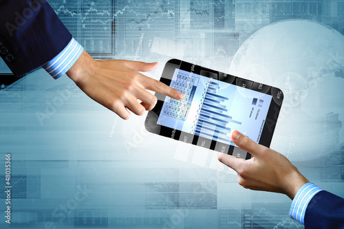 Photo: Modern computer technology in business Modern computer technology in business