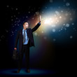 Businessman with light shining