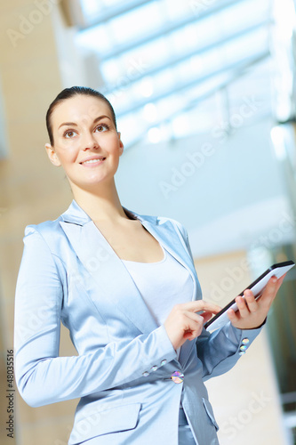Photo: portrait of a confident young businesswoman portrait of a confident young businesswoman