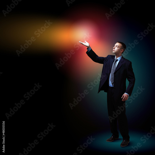 Photo: Businessman with light shining Businessman with light shining