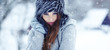 Girl playing with snow in park