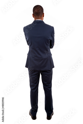 Photo: African American business man from the back over white backgroun African American business man from the back over white backgroun
