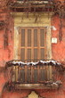 Romantic balcony with closed shutters in wintertime