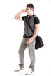 Photo: Full length portrait school boy talking phone Full length portrait school boy talking phone