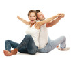 Portrait of young happy smiling couple sitting
