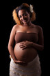 Young beautiful pregnant african woman
