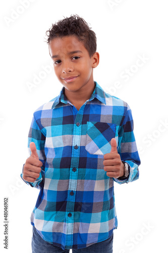 Photo: Portrait of a cute african american little boy making thumbs up Portrait of a cute african american little boy making thumbs up