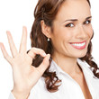 Foto: Businesswoman with okay gesture, isolated Businesswoman with okay gesture, isolated