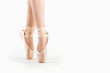 Photo: Feet close up of dancer isolated on white background. Feet close up of dancer isolated on white background.