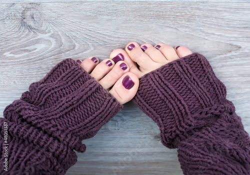 Photo: Female feet in brown socks Female feet in brown socks