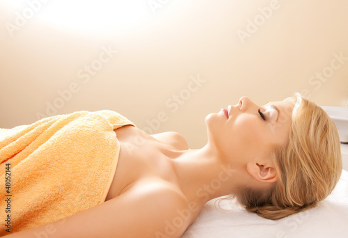 Photo: beautiful woman in spa salon beautiful woman in spa salon