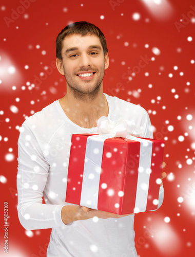 Photo: handsome man with a gift handsome man with a gift