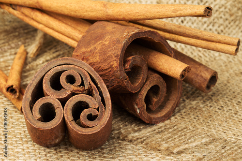 Photo: Cinnamon sticks on burlap Cinnamon sticks on burlap