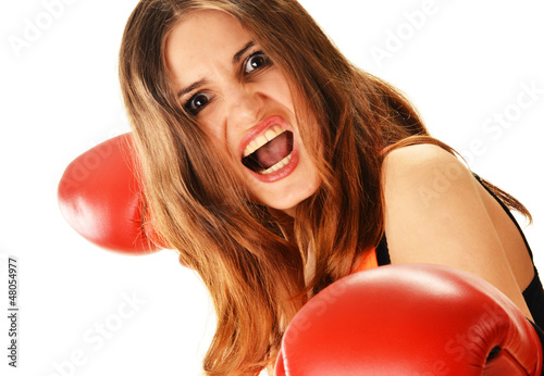Photo: Portrait of young woman with red boxing gloves Portrait of young woman with red boxing gloves