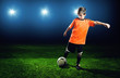 Child plays Soccer