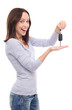 Young woman showing car key