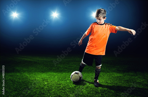 Photo: Child plays Soccer Child plays Soccer