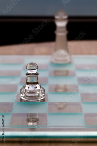 Photo: Pawn King Chess Pieces - Business Concept - coach, mentor. Pawn King Chess Pieces - Business Concept - coach, mentor.