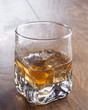 Glass of whiskey with ice