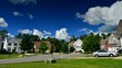 Time lapse of idyllic suburbs and rolling cumulus clouds