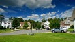 Time lapse of idyllic suburbs and rolling cumulus clouds
