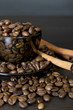 coffee beans, cup, Pots, cinnamon on dark background