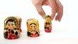 Matrioshka dolls placed in row and taken apart.