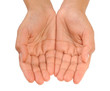 Beautiful cupped hands of young woman - cut out on white