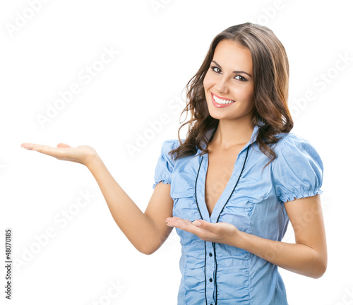 Photo: Beautiful young woman showing blank signboard Beautiful young woman showing blank signboard