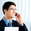 Businessman with documents or contract and phone