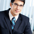 Happy smiling businessman at office