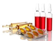 medical ampules, pills and syringes, isolated on white