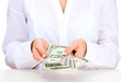 American dollars in a women hands, close up