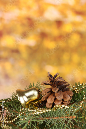 Photo: Christmas decoration on yellow background Christmas decoration on yellow background
