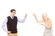 A young heterosexual couple arguing