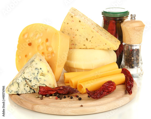 Photo: Various types of cheese isolated on white Various types of cheese isolated on white