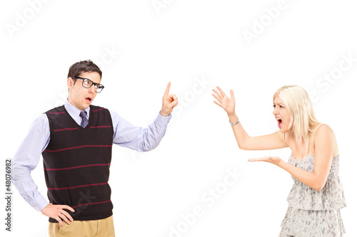 Photo: A young heterosexual couple arguing A young heterosexual couple arguing