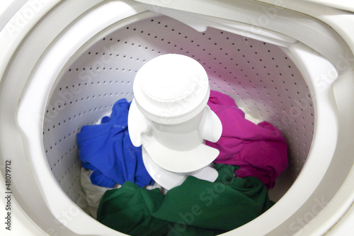 Photo: Washing Machine with Clothes Washing Machine with Clothes