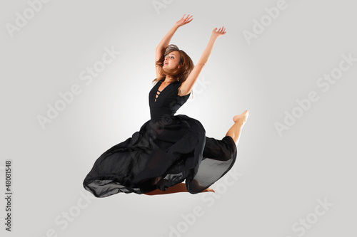 Photo: Young female dancer jumping Young female dancer jumping