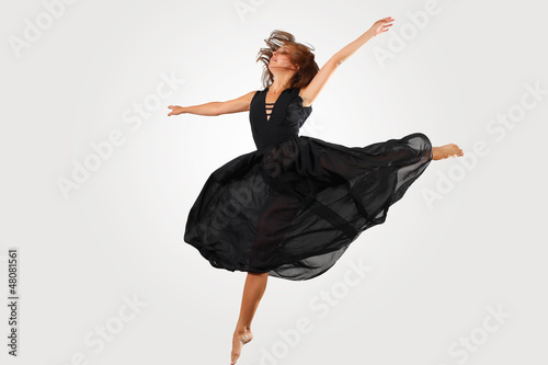 Photo: Young female dancer jumping Young female dancer jumping