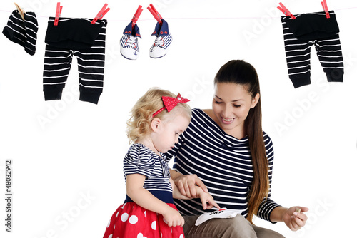 Photo: pregnant mother with her baby daughter pregnant mother with her baby daughter