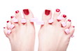 female feet red polished nails