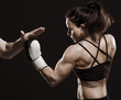 Foto: Beautiful fitness woman training boxing. Beautiful fitness woman training boxing.