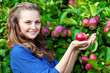 A woman in the apple garden