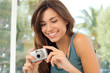 Photo: Happy Woman Taking Pictures Happy Woman Taking Pictures