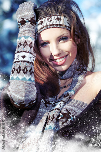 Photo: Young woman winter portrait. Shallow dof. Young woman winter portrait. Shallow dof.